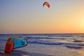 Kite surfing boarding at sea. sunset, the beach. Balance, extreme sports, active lifestyle Royalty Free Stock Photo