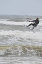 Kite surfing in spray.