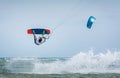 Kiteboarder kitesurfer man athlete jumping, kitesurfing kiteboarding jump