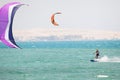 Kiteboarder surfing