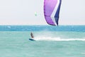 Kiteboarder surfing