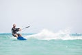 Kiteboarder surfing