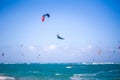 Kiteboarding. Fun in the ocean. Extreme Sport Kitesurfing. Kitesurfer jumping high in the air performing triks during Royalty Free Stock Photo