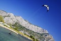 OMIS, CROATIA, SEPTEMBER 18, 2020 - Tourists enjoying kitesurfing during a windy sunny day in Omis Resort, Croatia. Royalty Free Stock Photo