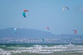 Kiteboarding kitesurfing kiteboarder kitesurfer kites on the ocean beach