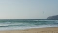 Kiteboarding - sailing surf on the coast of the Atlantic Ocean.