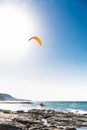 kiteboarding on sea waves on blue sky summer background. Kitesurfing on Cyprus Royalty Free Stock Photo