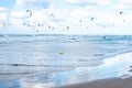 A lot of kiters and surfers at sea in Tel Aviv