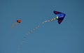 Kites flying in the blue sky, dragon. danger of contact with high voltage wires, will cause shock and injury to children and adult Royalty Free Stock Photo