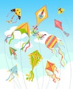 Kites in sky. Bright air toys in clouds, color flying controlled objects on strings, different design bee and smiling Royalty Free Stock Photo