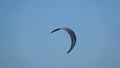 Kitesurf kite against clear sky. Kite flying in air scenic background. Imbros Island.