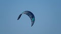 Kitesurf kite against clear sky. Kite flying in air scenic background. Imbros Island.