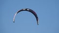 Kitesurf kite against clear sky. Kite flying in air scenic background.