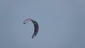 Kitesurf kite against clear sky. Kite flying in air scenic background.