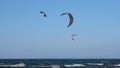 Kitesurf kites against clear sky. Kites flying in air scenic background. Royalty Free Stock Photo