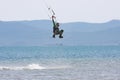 Kitesurfer doing a trick Royalty Free Stock Photo