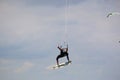 Kitesurfer jumping high