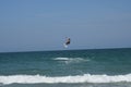 Kitesurfer leaping over waves off Wrightsville Beach Royalty Free Stock Photo