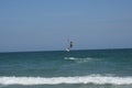 Kitesurfer leaping over waves off Wrightsville Beach Royalty Free Stock Photo