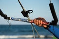 Kitesurfer ready for kitesurfing rides in blue sea