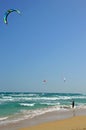 A kitesurfer ready to go to emerald water of Atlantic Ocean