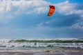 Kitesurfer ride the big surf