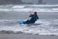 Kitesurfer riding waves Royalty Free Stock Photo