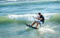 Kitesurfer riding on Kiteboard on the beach in Ulcinj, Montenegr