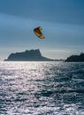 Kitesurfer sailing in Mediterranean Sea