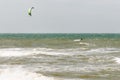 Kitesurfer in waves