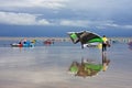 Kitesurfers on a beach Royalty Free Stock Photo