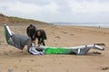 Kitesurfers preparing kite