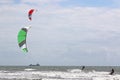 Kitesurfers riding the waves Royalty Free Stock Photo