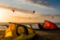 Kitesurfing beach, kiteboarding sport, kites n the beach and in the air at sunset, golden our landscape of Kite location, February