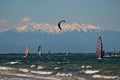Kitesurfing in front of Mont Canigou, Leucate Royalty Free Stock Photo