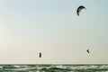 Kitesurfing at the seaside with big waves