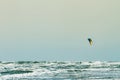 Kitesurfing at the seaside with big waves