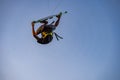 kitesurfing. A surfer doing all kinds of stunts at sunset. International Kitesurfing Exhibition 2023