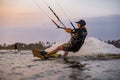 kitesurfing. A surfer doing all kinds of stunts at sunset. International Kitesurfing Exhibition 2023