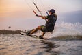 kitesurfing. A surfer doing all kinds of stunts at sunset. International Kitesurfing Exhibition 2023