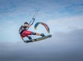 Kiteboarder kitesurfer athlete jumping, kitesurfing kiteboarding jump