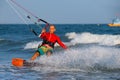 Kitesurfing on the waves of the sea in Mui Ne beach, Phan Thiet, Binh Thuan, Vietnam.