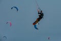 Kitesurfing on the waves of the South China sea, Vietnam. Royalty Free Stock Photo