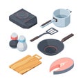 Kithhen cook set. Electric stove white cooking ladle slice of red fish frying pan for frying pepper salt, wooden board Royalty Free Stock Photo