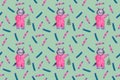 Kitten in pyjamas pattern green background