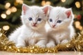 Kittens engage in play with tinsel and festive Christmas balls