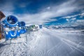 KITZBUEHEL, AUSTRIA - February 17, 2016 - Snow cannons with fresh prepared ski slopes with the corduroy pattern in Kitzbuehel ski