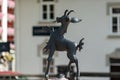 Kitzbuehel, Tirol/Austria - September 18 2018: small statue of the mascotte of Kitzbuehel a capricorn with shallow depth of field