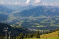 Kitzbuheler Hornbahn cable car with view of valley, mountains, S