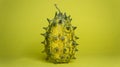 Kiwano, African cucumber, vegetable on yellow background